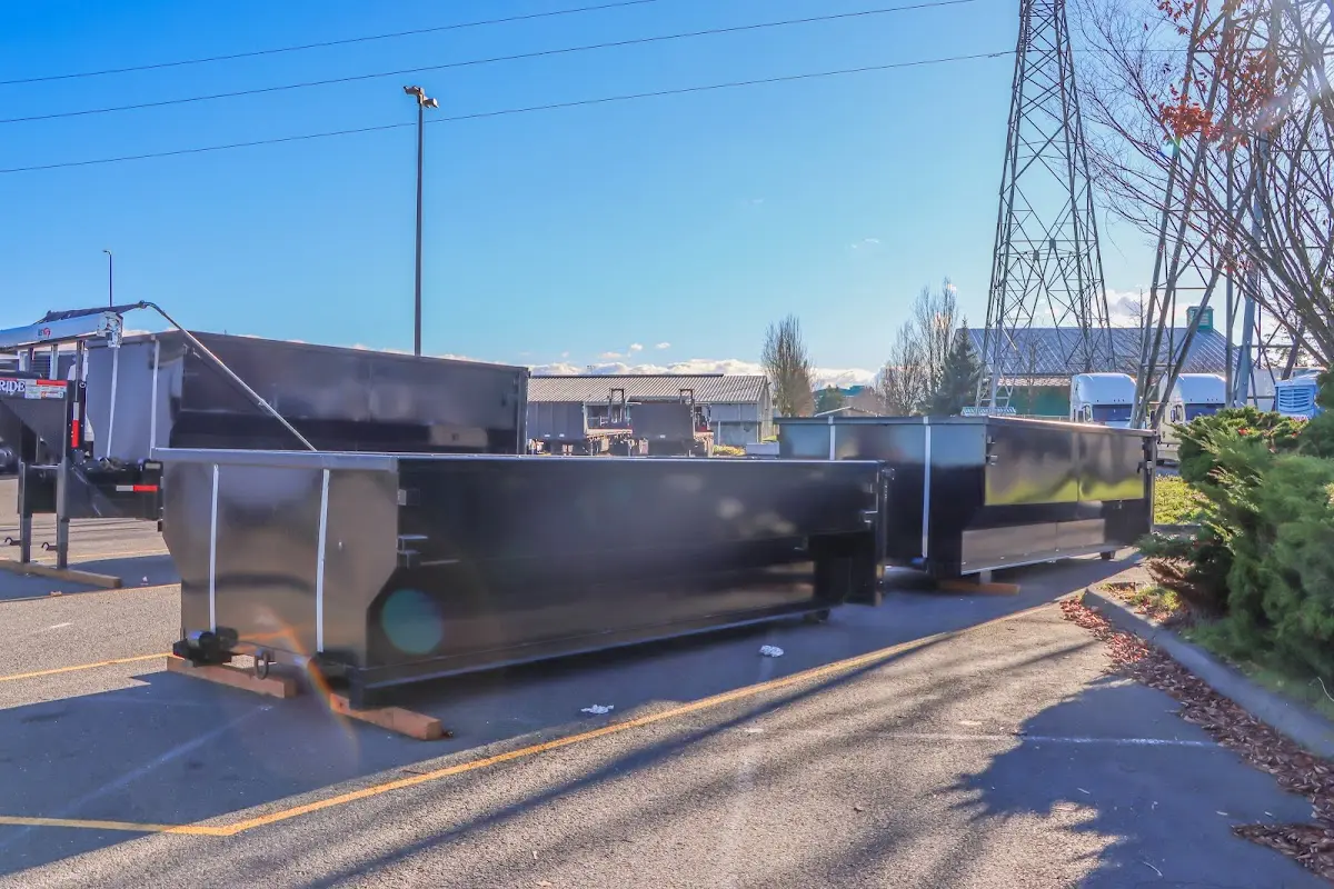 Roll-off dumpster ready for waste disposal at job site for 6 Yard Dumpster Rental in Milton